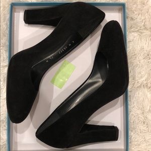 Black suede pumps